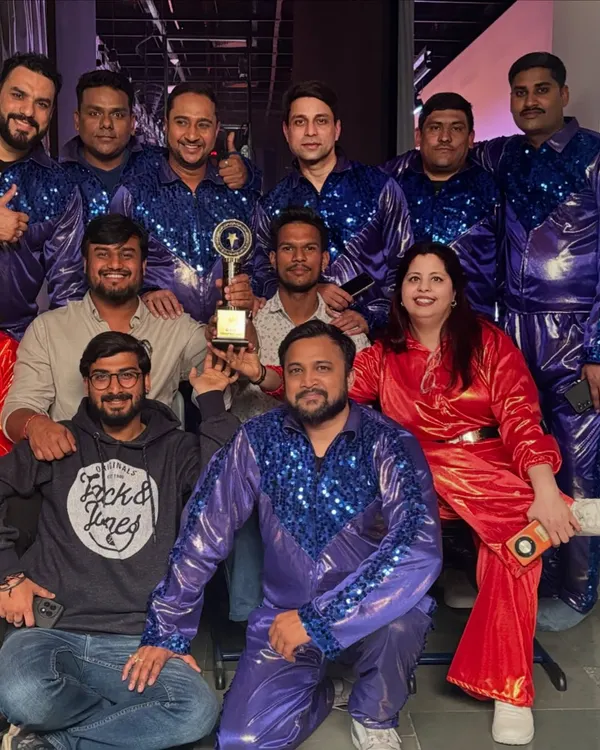 Celebrating a win with the performers at a corporate awards show. I provide complete event solutions, including costumed dancers that match the theme of your company's celebration.