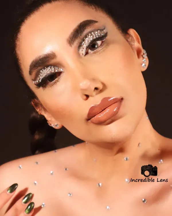 A full view of the rhinestone-encrusted eye makeup. I meticulously placed each stone to create a gradient of sparkle, resulting in a look that is pure fantasy and perfect for avant-garde projects or music videos.