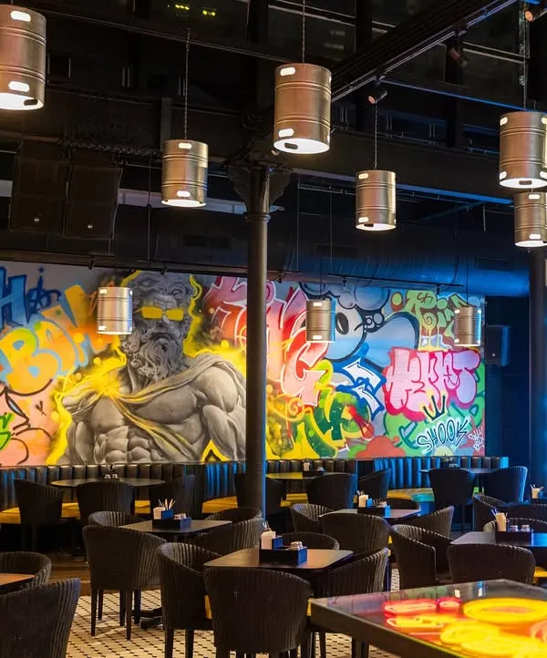 The finished mural for the new Lil Gamby restaurant in Parel. This project combined portraits, characters, and graffiti to create a vibrant, high-energy atmosphere for the space.