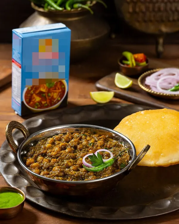 The final shot of Chole Bhature for Rakesh Masala, shown next to the product packaging it was created for. This demonstrates how I create an aspirational serving suggestion for a packaged good.