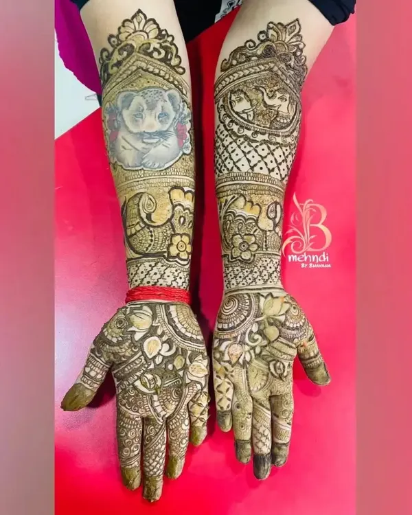 A clear, close-up view of the custom pet portrait. I worked from a photo to capture the likeness of this adorable dog, making the bride's henna extra special.