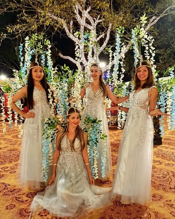 We also provide international artists for your events. These Russian performers, dressed in elegant gowns, are perfect for welcoming guests with a touch of glamour.