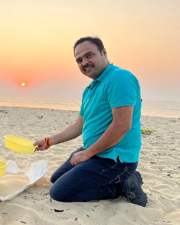 It all begins with sand. Here I am at the beach, the source of my primary material, connecting with the earth that inspires my work.