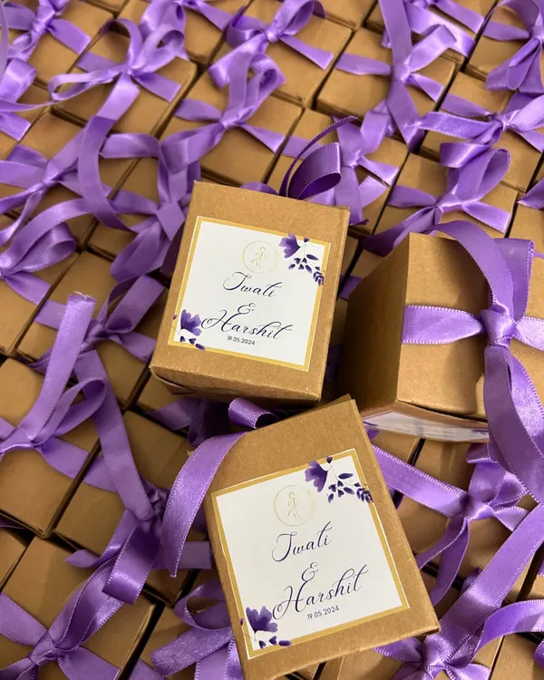 A large bulk order for Harshit and Twati's wedding, all packed and ready to go. The purple ribbon and custom label matched their theme perfectly.