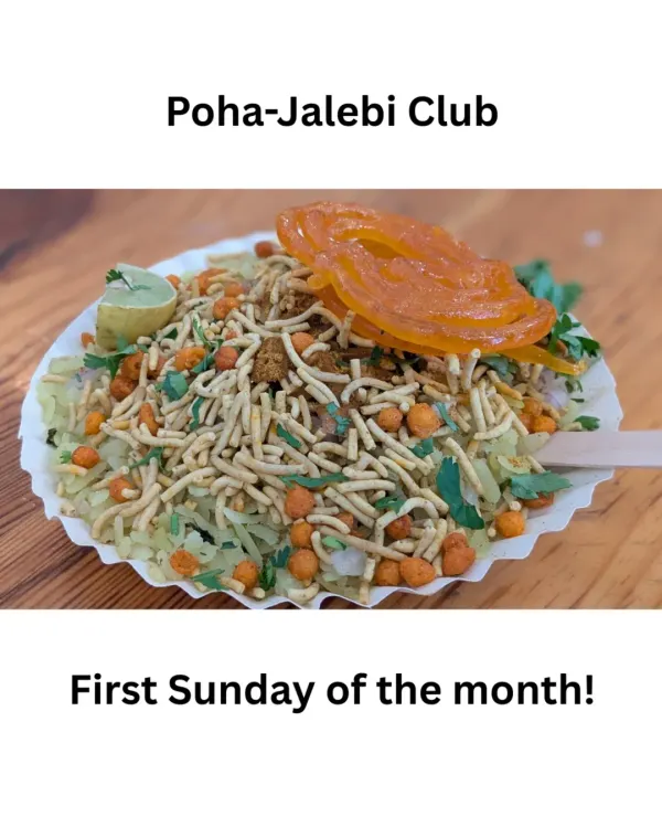 It all starts here. A delicious plate of Indori poha, topped with sev and a sweet jalebi. This isn't just food; it's a conversation starter and a piece of home that brings everyone to the table.