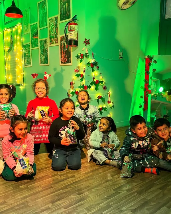 Our Powerpuff Beginners celebrating Christmas together. The studio is filled with smiles, laughter, and festive cheer.