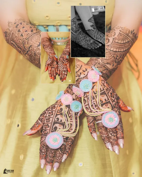 A detailed shot of bride Harshna's intricate mehndi design on her hands and feet, adorned with colorful gota patti jewelry.