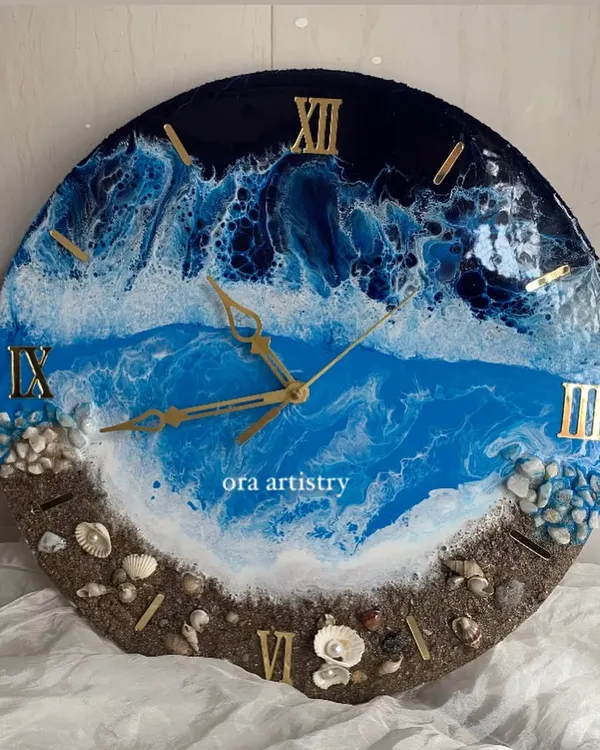 A stunning ocean-themed resin clock, complete with crashing waves, a sandy shore, and real shells. This is one of my most requested workshop projects.