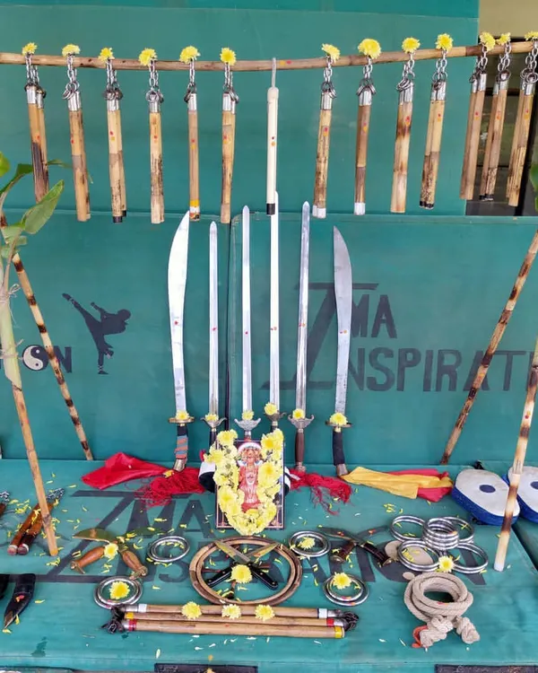 A display of our training tools during the Ayudha Pooja. Each weapon, from the nunchucks and broadswords to the rope darts and Bo staffs, has its own spirit and discipline.