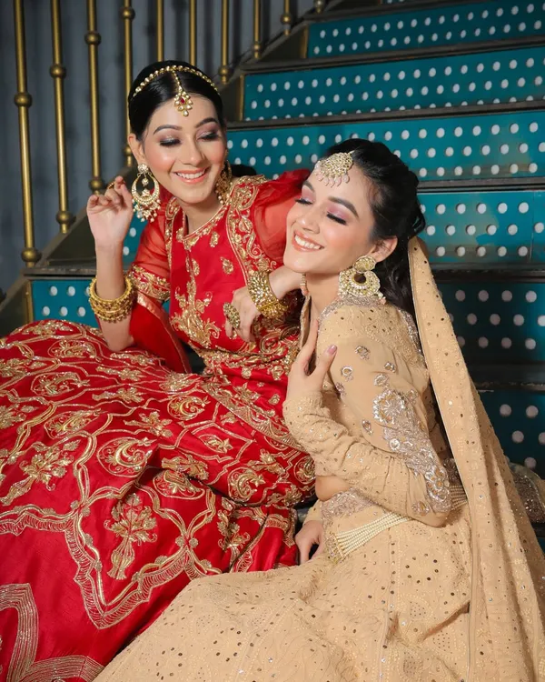 A glimpse into my Riwayat bridal collection. These two models showcase traditional hairstyles with intricate details, paired with flawless makeup, perfect for a classic wedding look.