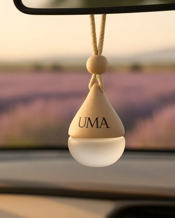 My car freshener hanging in front of a calming lavender field. I offer these in five soothing fragrances, including Lavender and Sandalwood, to turn every ride into a scented escape.