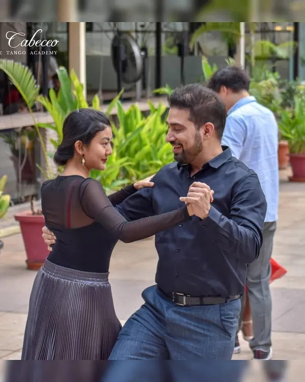 A candid moment of joy and communication between two dancers at our U B City flash mob. This is what learning Tango is all about.