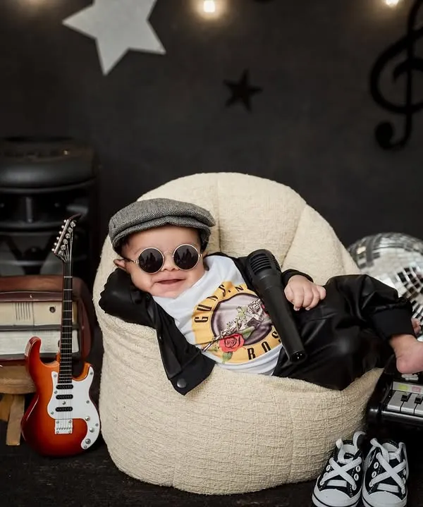 Get ready to meet a future rockstar. Our creative studio sessions allow your child's personality to shine, and we had so much fun putting together this cool, musical-themed shoot.