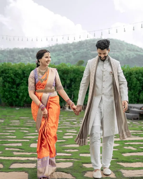 Our client Anusha begins her forever journey, draped in a stunning lavender and red silk saree for her engagement. This piece perfectly harmonizes delicate lavender with passionate red, symbolizing a beautiful new chapter.