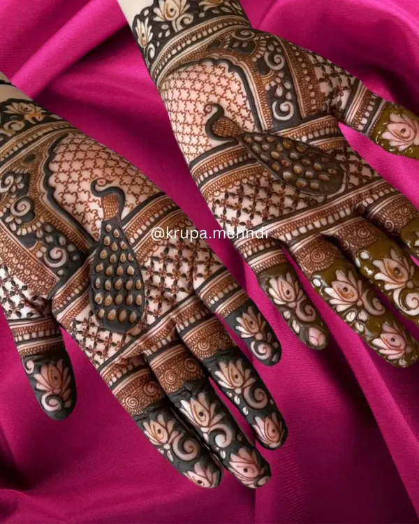 Getting into the festive spirit with this gorgeous peacock and lotus design. Bookings for Navratri and Karwa Chauth are now open!