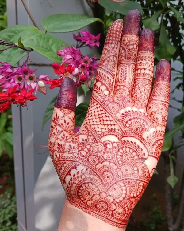 This is the beautiful, rich maroon color you can expect from my organic henna after the stain has fully matured. The deep color is a result of using 100% natural ingredients and proper aftercare.