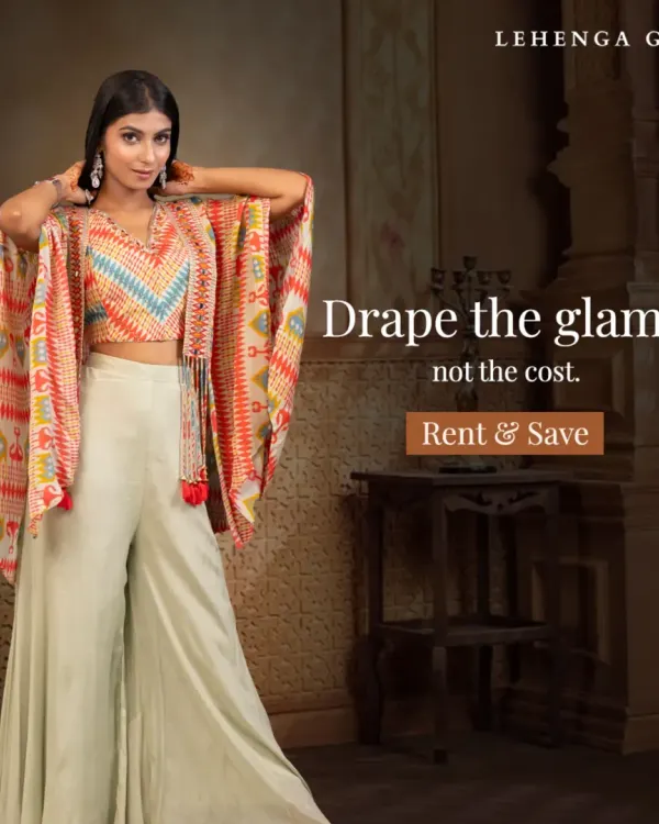Drape the glam, not the cost. This trendy mint green palazzo set with a colorful printed cape is the perfect modern outfit for a fun mehendi or sangeet ceremony.
