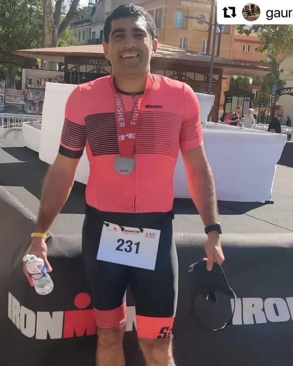 The moment of triumph. Gaurav proudly displaying his finisher medal after conquering the IRONMAN 70.3 in France. A testament to his hard work and our dedicated coaching partnership.
