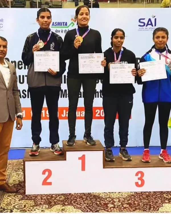 Gold for our champion. We celebrate Aakansha Singh on the winner's podium after securing the gold medal at the Khelo India Boxing competition. Her victory is a testament to her hard work and the spirit of our academy.