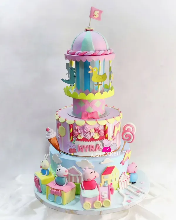This three-tiered Peppa Pig party cake was a joy to create, featuring a handmade, rotating carousel and numerous edible characters. It's a perfect example of how I can build an entire themed world for a birthday celebration.