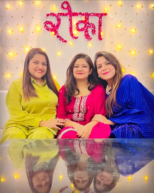 A photo from a family Roka ceremony. I'm wearing a royal blue pleated co-ord set, a comfortable yet festive choice for family functions.