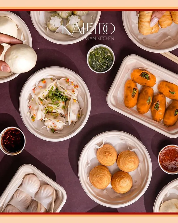 This is what a party looks like when I handle the food. This gourmet spread features a variety of my handmade dim sum and appetizers, all packed and ready to delight your guests.