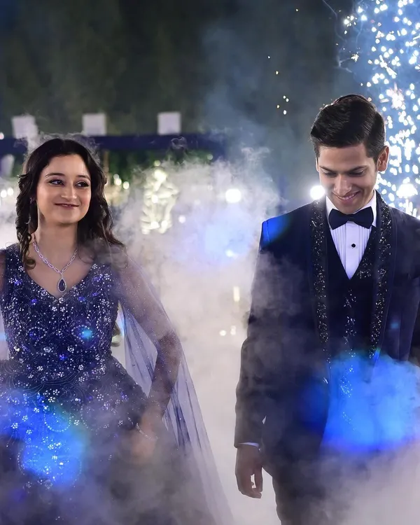 A magical entry for the couple, complete with smoke effects that created a dreamy, walking-on-clouds feel. I coordinate with the technical team to ensure these effects are timed perfectly.