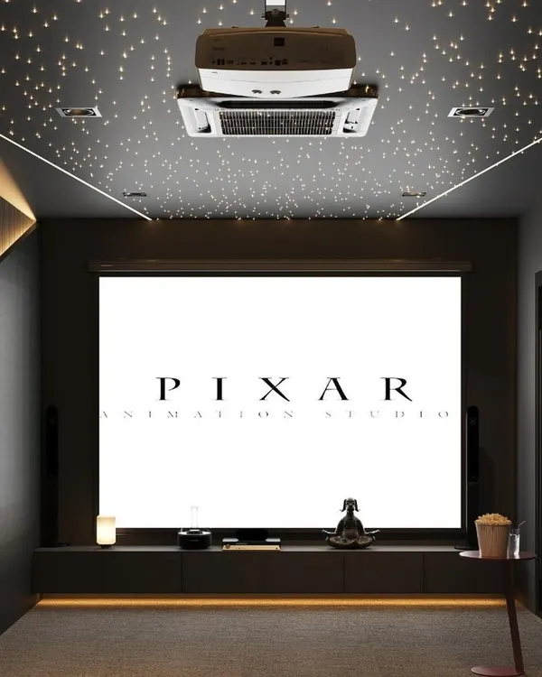 This is what I call cinema therapy. I design dedicated home theaters that provide a complete cinematic experience, focusing on acoustic performance, comfortable seating, and ambient lighting like this starlit ceiling to transport you to another world.