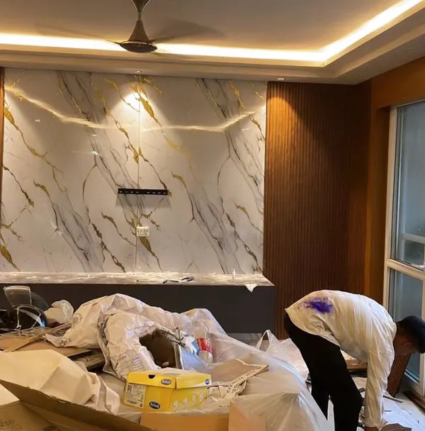 This is the kind of transformation I deliver. For this living room, I designed and installed a complete TV unit wall using a combination of high-gloss UV marble sheets and textured WPC fluted panels. The integrated profile lighting and clean finish create a modern, premium centerpiece for the home.