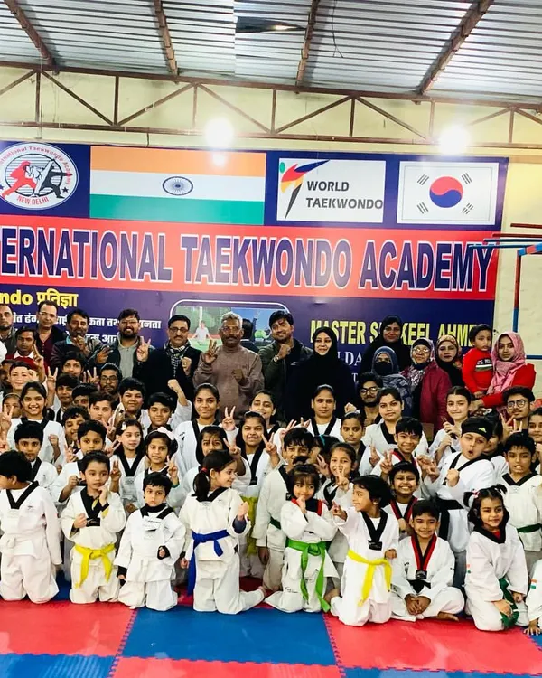 A group photo from one of our Belt Promotion Tests. It is a day of celebration where students, parents, and instructors come together to recognize the hard work and progress of our members.