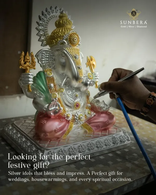 This is where divinity gets its final touch. Our artisan is carefully hand painting a large silver Ganesha idol, a process that ensures every detail is perfect. This piece is ideal as a centerpiece for a temple or a truly special festive gift for weddings and housewarmings.