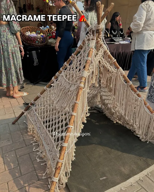 Our handmade macrame teepee was a huge hit at the exhibition. It's a perfect, magical play space for kids or a unique decor piece for a boho-themed event.