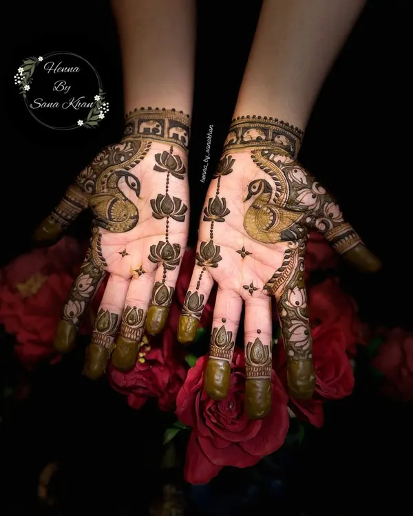 A stunning symmetrical design featuring the majestic peacock and the pure lotus flower, two of the most beloved motifs in traditional Indian mehndi.