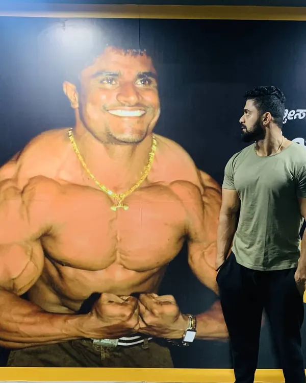 Looking up to my inspiration, my uncle Kitty Murthy, whose picture is on the wall of our gym. He is my god, and his guidance has shaped my entire career.