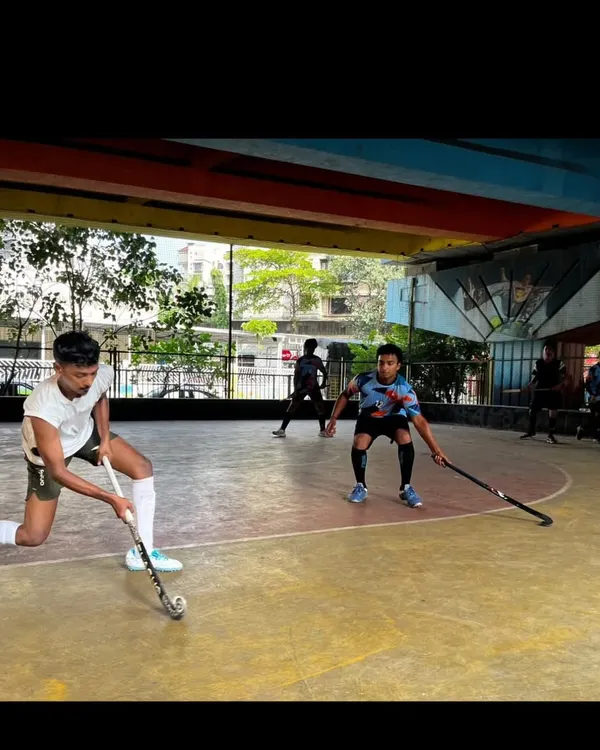 An action shot from our Sunday rink hockey session. The hard surface demands precise ball control and quick decision-making, skills that translate well to any format of the game.