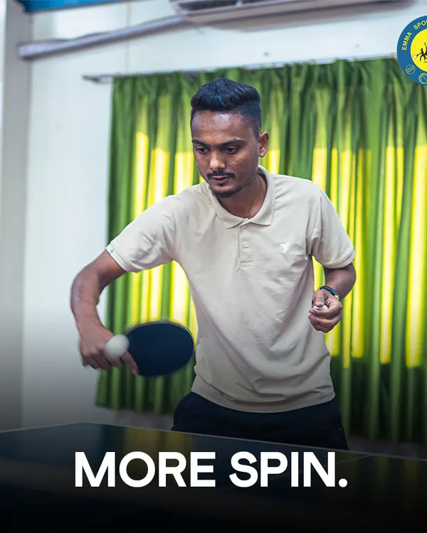 A player demonstrates how to generate heavy spin on the ball. Our indoor facility is the perfect place to practice advanced techniques like topspin, backspin, and sidespin.