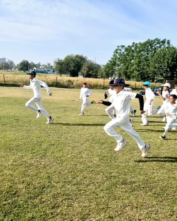 A proud moment for our Under-12 team, celebrating a 5-wicket victory. This is a testament to the hard work and dedication of our young champions.