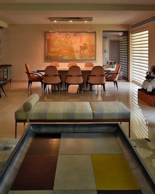 This 30-year-old home was once a collection of dark, inward-looking rooms. My design strategy was to break down the walls and open the space to the garden, creating a fluid, interconnected living area with a pale, serene palette.