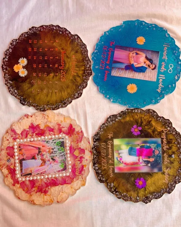 This image shows the wonderful variety you can choose from. Here are four different custom photo platters, each with a unique color scheme, from preserved rose petals to a bold blue ocean theme.