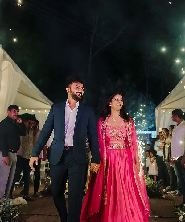 We believe every celebration deserves a grand entrance. Here, we created a magical pathway with cold pyro sparklers for the couple's arrival at their cocktail event, set within a serene coffee estate.