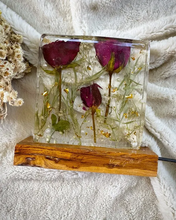 Preserved with love. A client's special bouquet roses transformed into a glowing memory, sealed forever in this handcrafted rectangular resin block lamp.