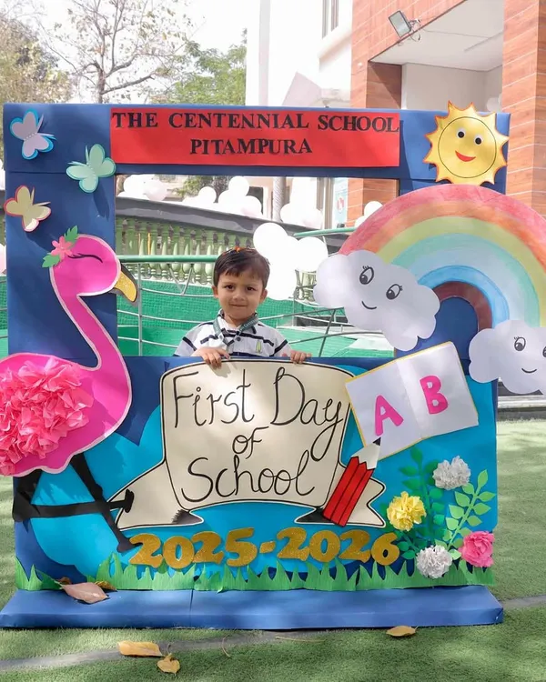 Small steps towards big dreams. A proud student poses at our 'First Day of School' photo booth, marking the beginning of an exciting educational journey.