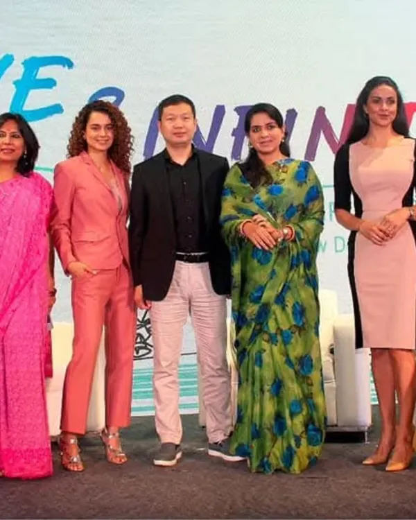 On stage at the 'Love & Infinity' Philanthropy Conference with fellow panelists. United, we can move forward and create meaningful change.