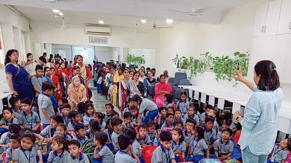 This is where the magic happens. I am leading an interactive nutrition workshop for school children and their parents. My goal is to make learning about healthy eating a fun and engaging experience for the entire family, building a foundation for lifelong wellness.
