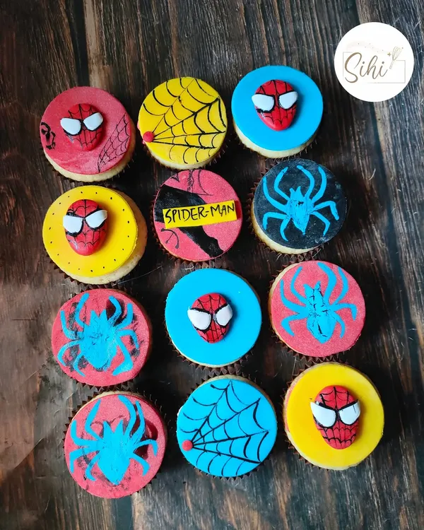 Your friendly neighborhood Spider-Man, in cupcake form. This set includes a mix of 3D fondant Spidey masks, hand-painted logos, and web designs.