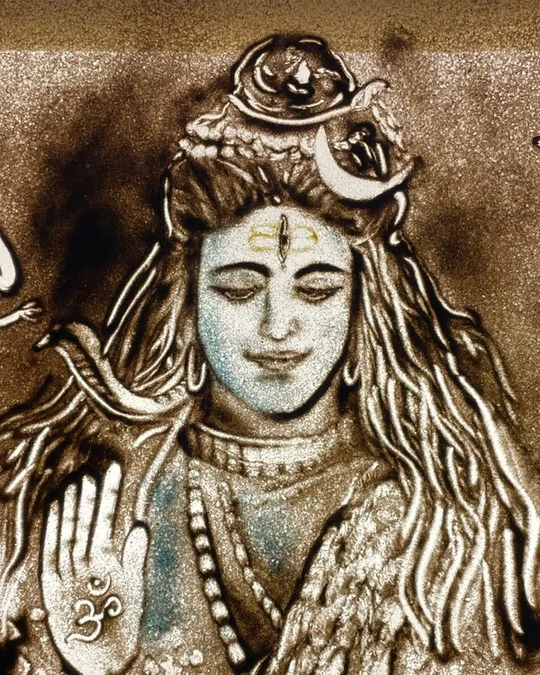 A detailed sand portrait of Lord Shiva for Mahashivratri, showing him with his damru and trishul. I love using colored sand to add vibrancy and a divine feel to these cultural illustrations.