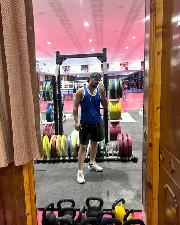 A quick selfie in the gym mirror at the NIS facility. The place is equipped with everything a serious athlete needs.