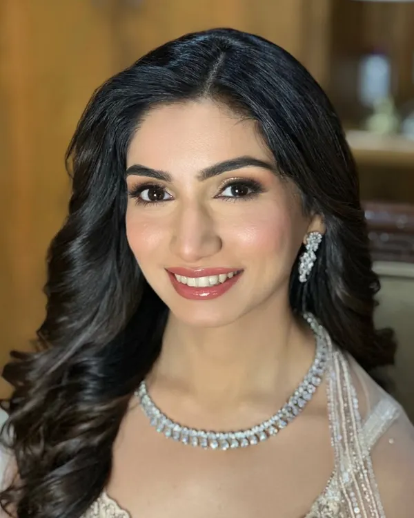 A classic Roka bride look. I created a soft, natural glam with a flawless base, subtly defined eyes, and a glossy pink lip, paired with beautiful soft waves in her hair.