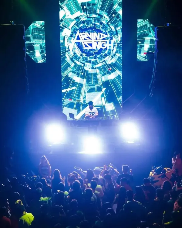 This is my view from the stage. A sea of people, hands in the air, all connected by the music. I bring this level of energy to every gig, from massive stages like this one at Sunburn Union to more intimate club nights.