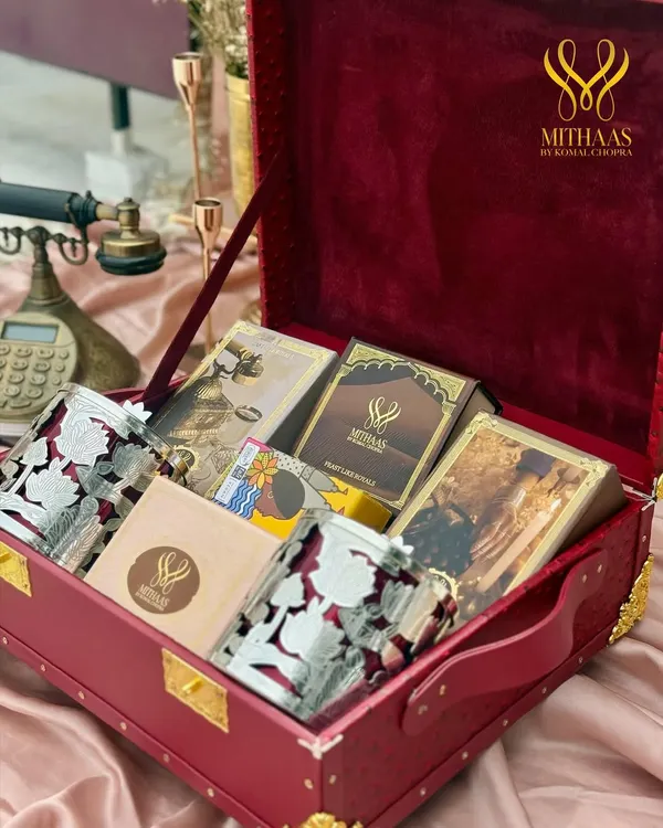 This is more than a gift, it is an heirloom of flavors. I designed this experience to feel like stepping into royal splendor, with a rich red velvet trunk filled with an assortment of my finest gourmet desserts and treats.
